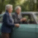 An elderly couple reviewing car insurance options together