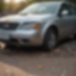 A detailed view of a damaged car showing the extent of repairs needed.