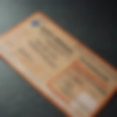 A close-up of a ticket showing fines for driving without insurance.