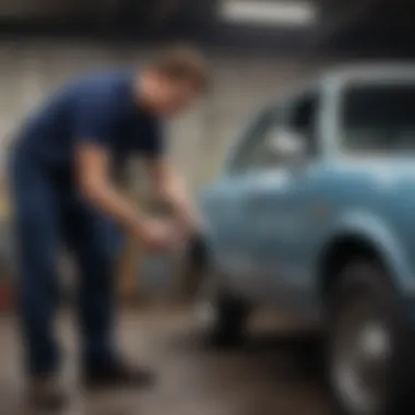 Mechanic inspecting a vehicle for salvage title indicators