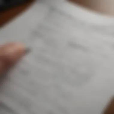 Close-up of a vehicle registration document being reviewed with a pen