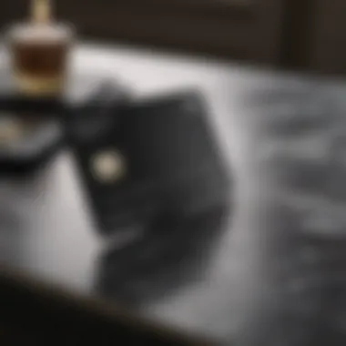The Allure of Luxury in Credit Cards A luxurious black credit card resting on a marble table.