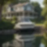 A serene view of a boat anchored near a house, illustrating the connection between homeowners and boat insurance.