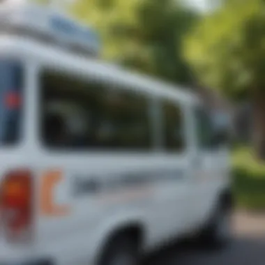 A mobile repair van parked beside a vehicle, showcasing the convenience of on-site car window fixes.